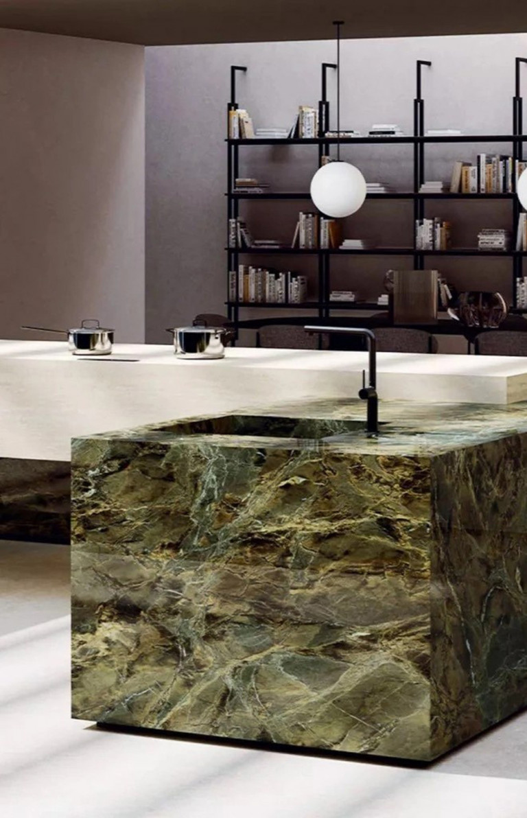22b12001-04-768x1192-1 Bếp ẩn bên dưới mặt bàn đá giúp tăng tính thẩm mỹ, đồng thời tăng diện tích giúp bàn bếp. Ảnh: Marazzi.
